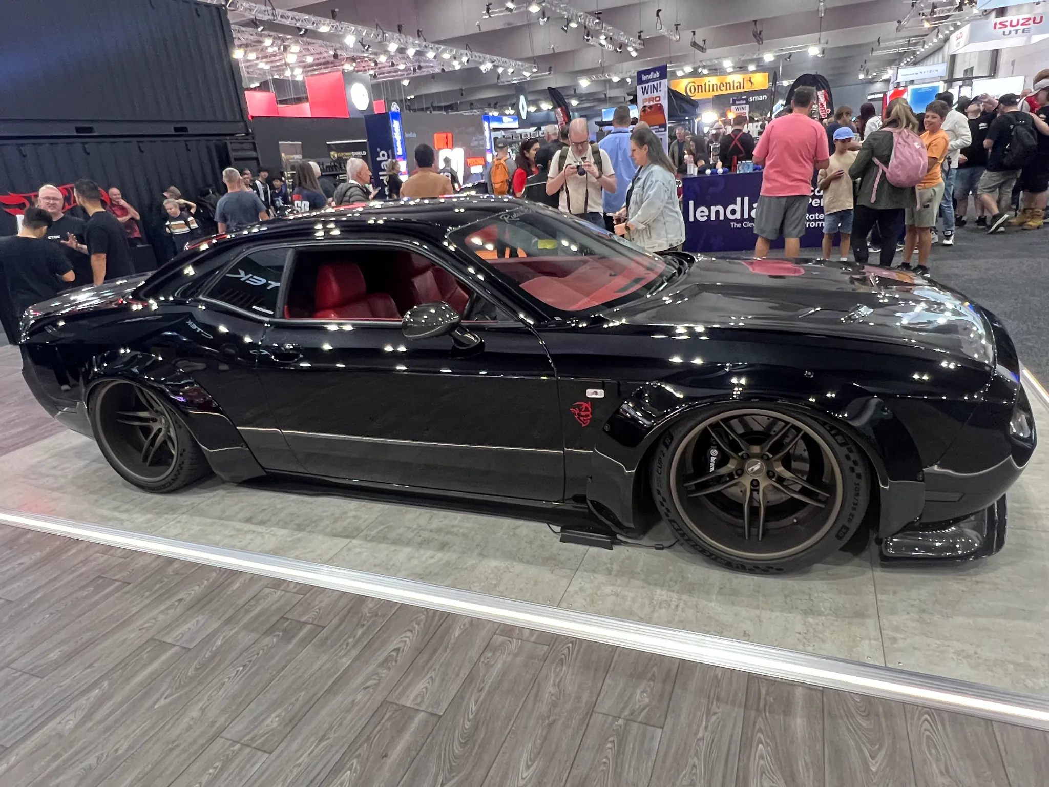 Black Dodge Challenger with red interior at Melbourne Motor Show 2026