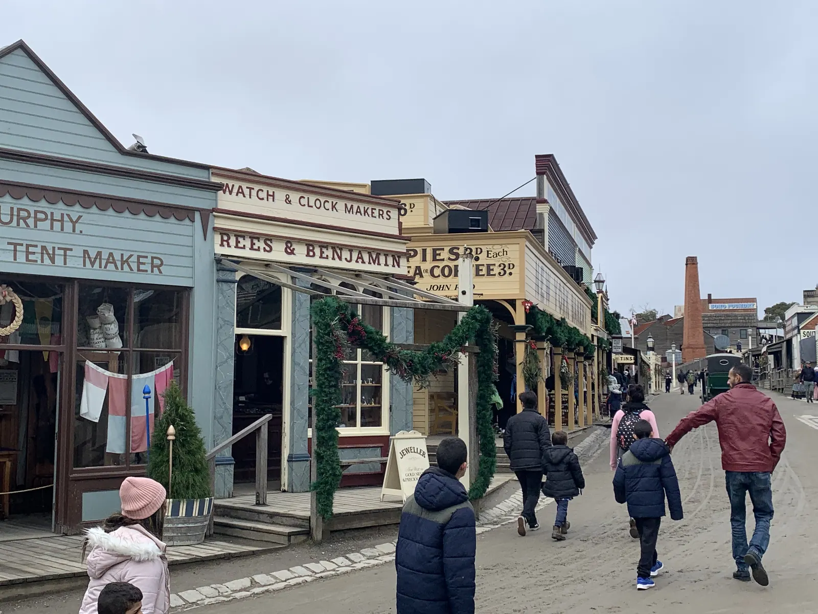 Historic shopfronts with Christmas garlands on Main Street at Sovereign Hill