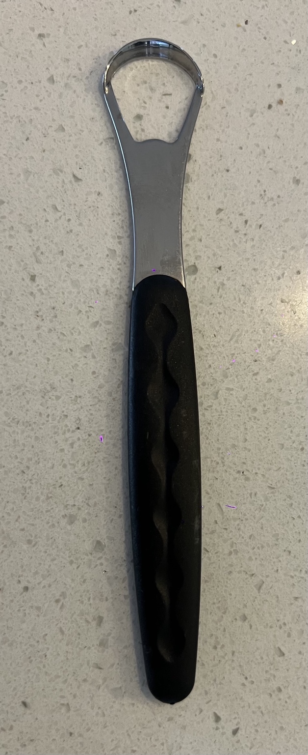Tongue scraper used as part of the morning routine